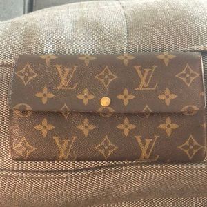 Authentic Louis Vuitton monogram wallet 7.25inLx4inW